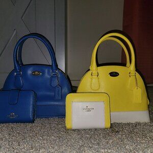 Coach Handbag. The yellow one just sold. The blue one and wallet is for sale.